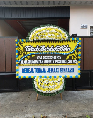 Papan Bunga Duka di Laban